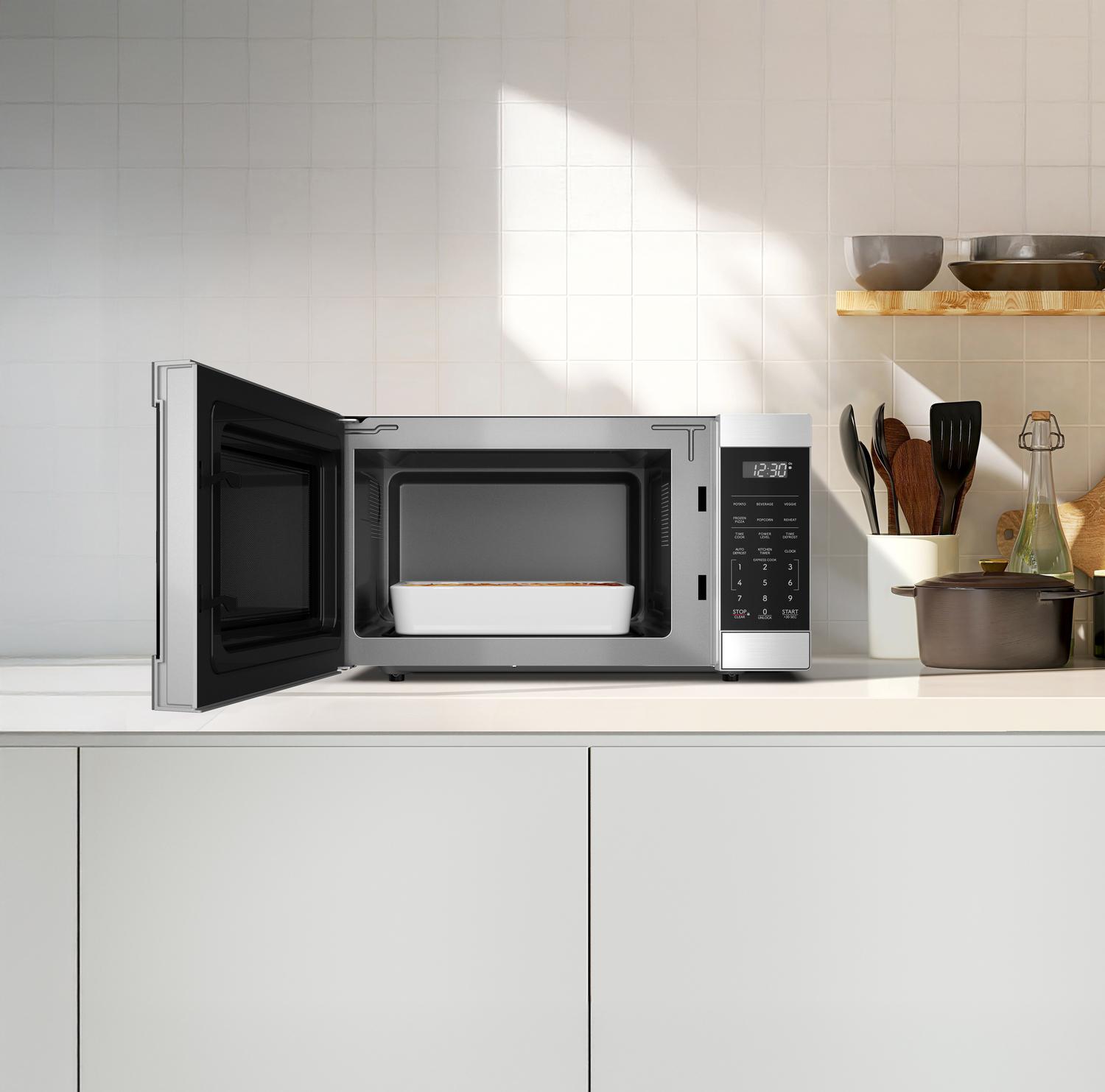 SMC1174KS Sharp 1.1 cu. ft. 1100W Flatbed Countertop Microwave Oven with Inverter Technology