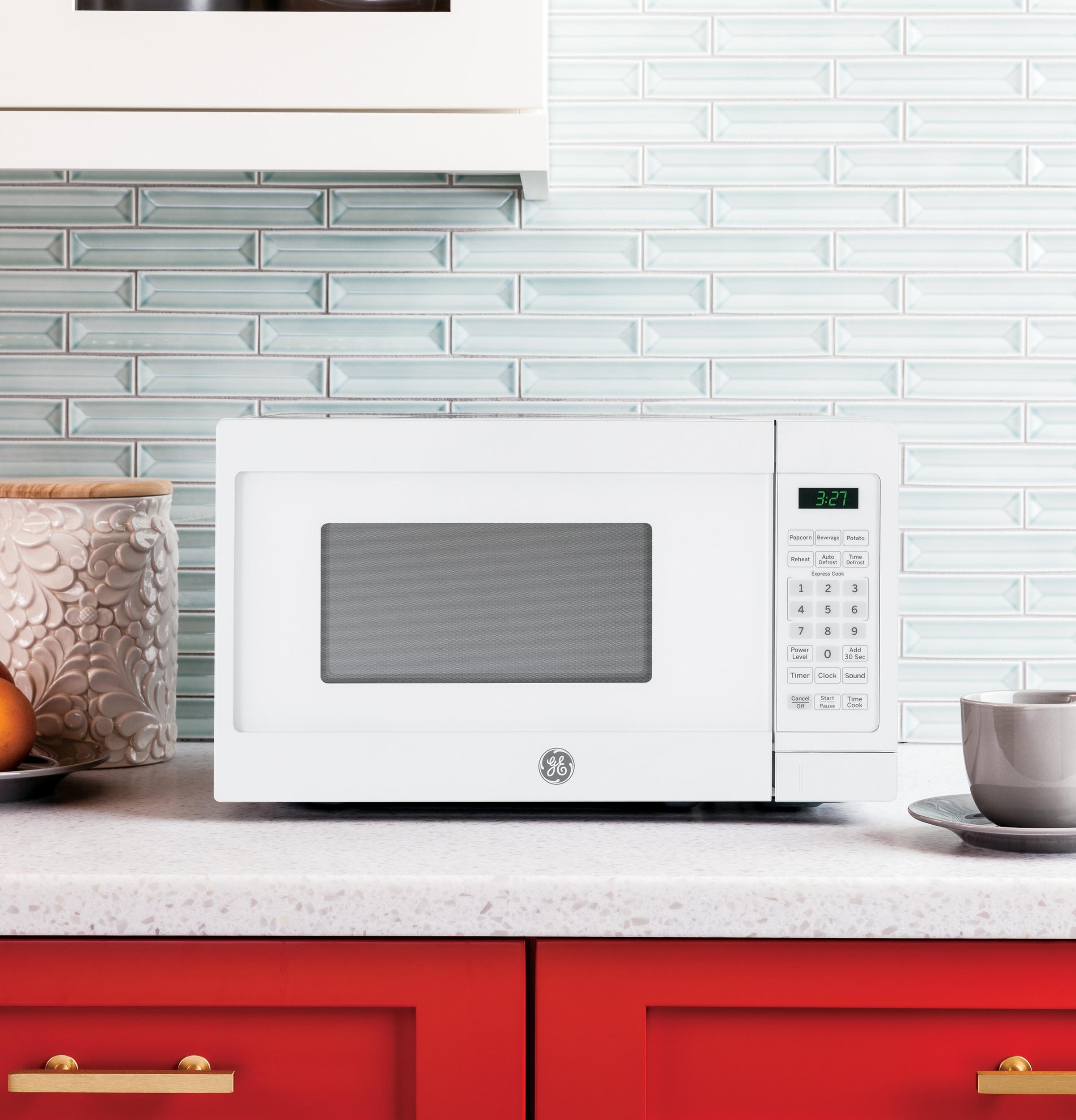GE® 0.7 Cu. Ft. Spacemaker® Countertop Microwave Oven