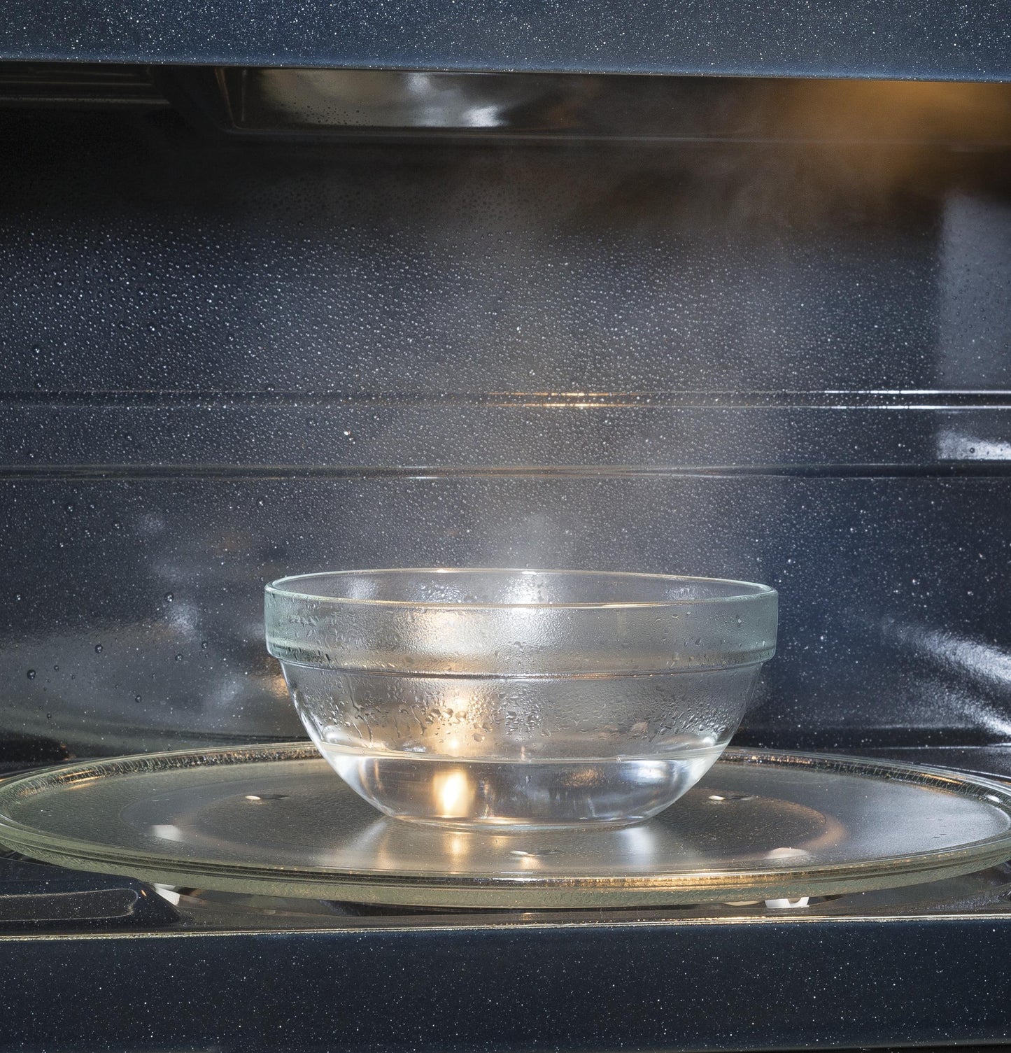 JNM7196SKSS GE® 1.9 Cu. Ft. Over-the-Range Sensor Microwave Oven with Recirculating Venting