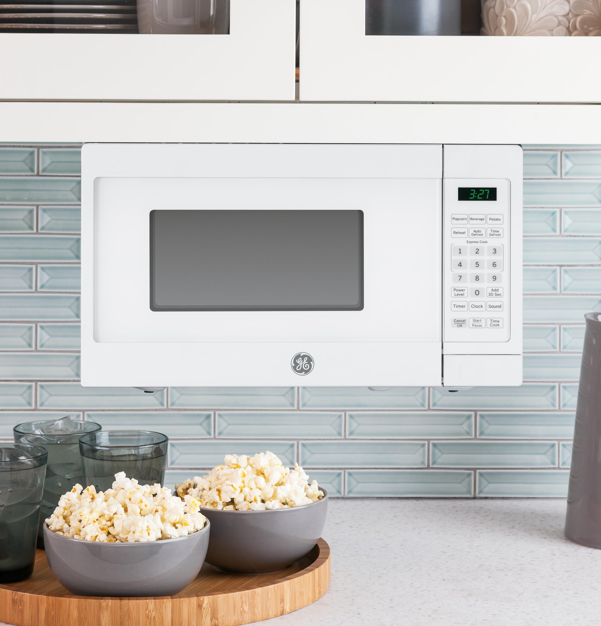 GE® 0.7 Cu. Ft. Spacemaker® Countertop Microwave Oven