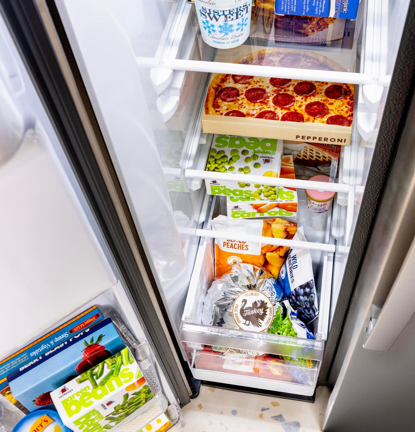 GZS24NYYFS GE® 23.6 Cu. Ft. Counter-Depth Side-By-Side Refrigerator with Extra Tall Dispenser and In-Door Icemaker