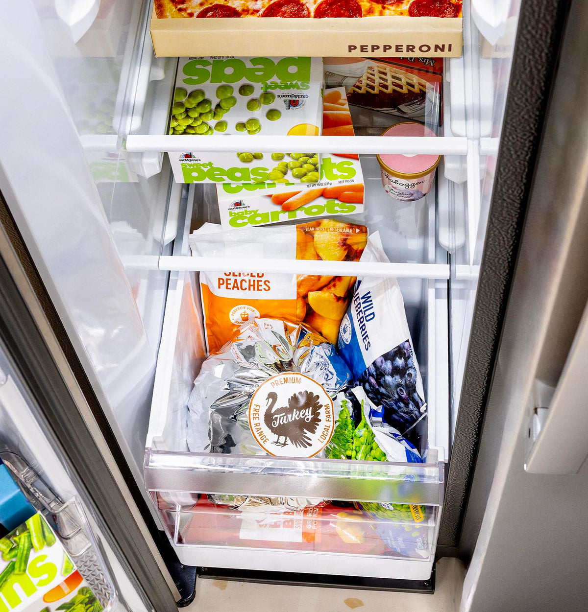 GKS24NYYFS GE® 24.2 Cu. Ft. Counter-Depth Side-By-Side Refrigerator with Internal Dispenser and In-Door Icemaker