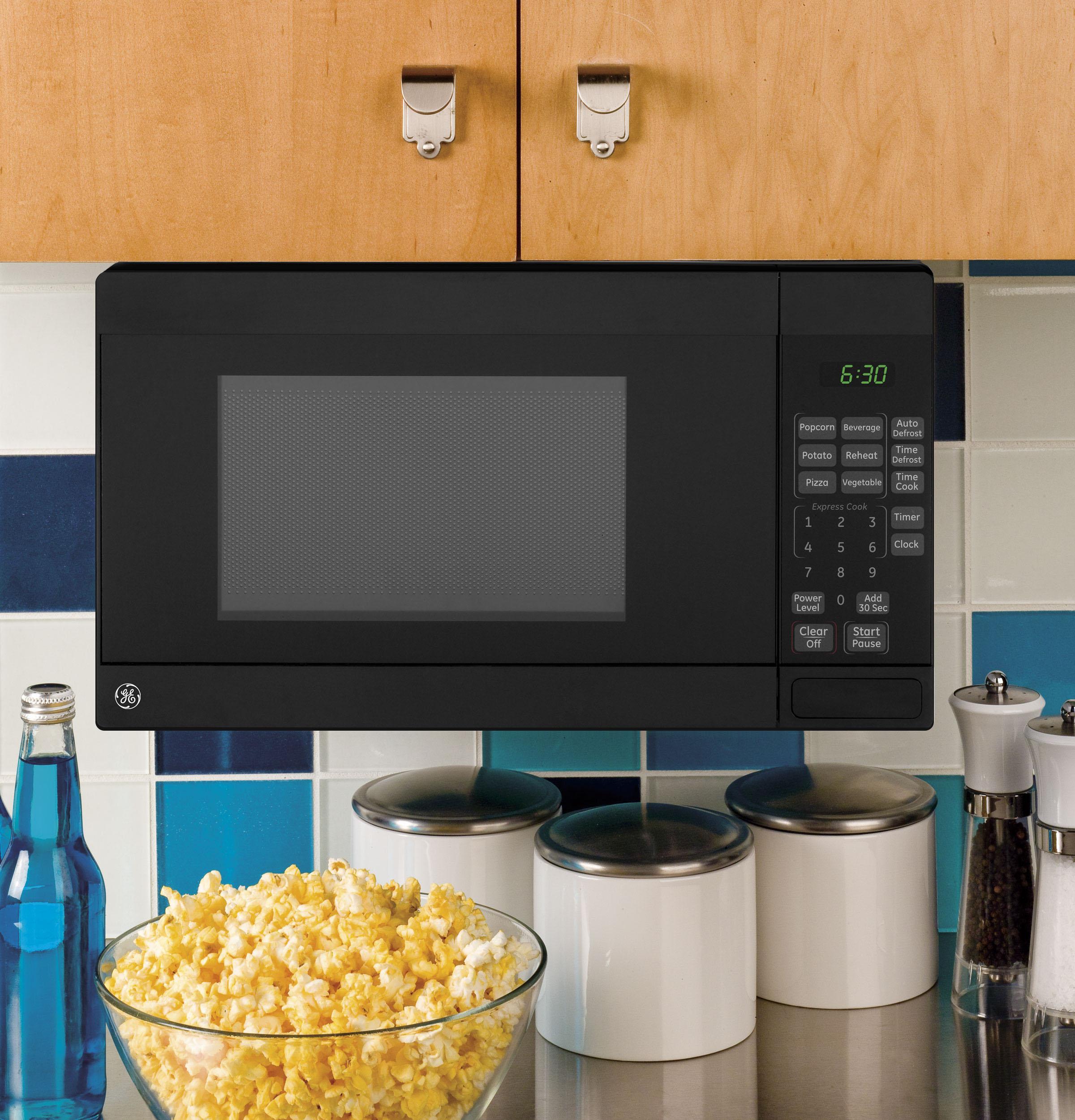 GCHK07N1WWW GE® 0.7 Cu. Ft. Spacemaker® Countertop Microwave Oven