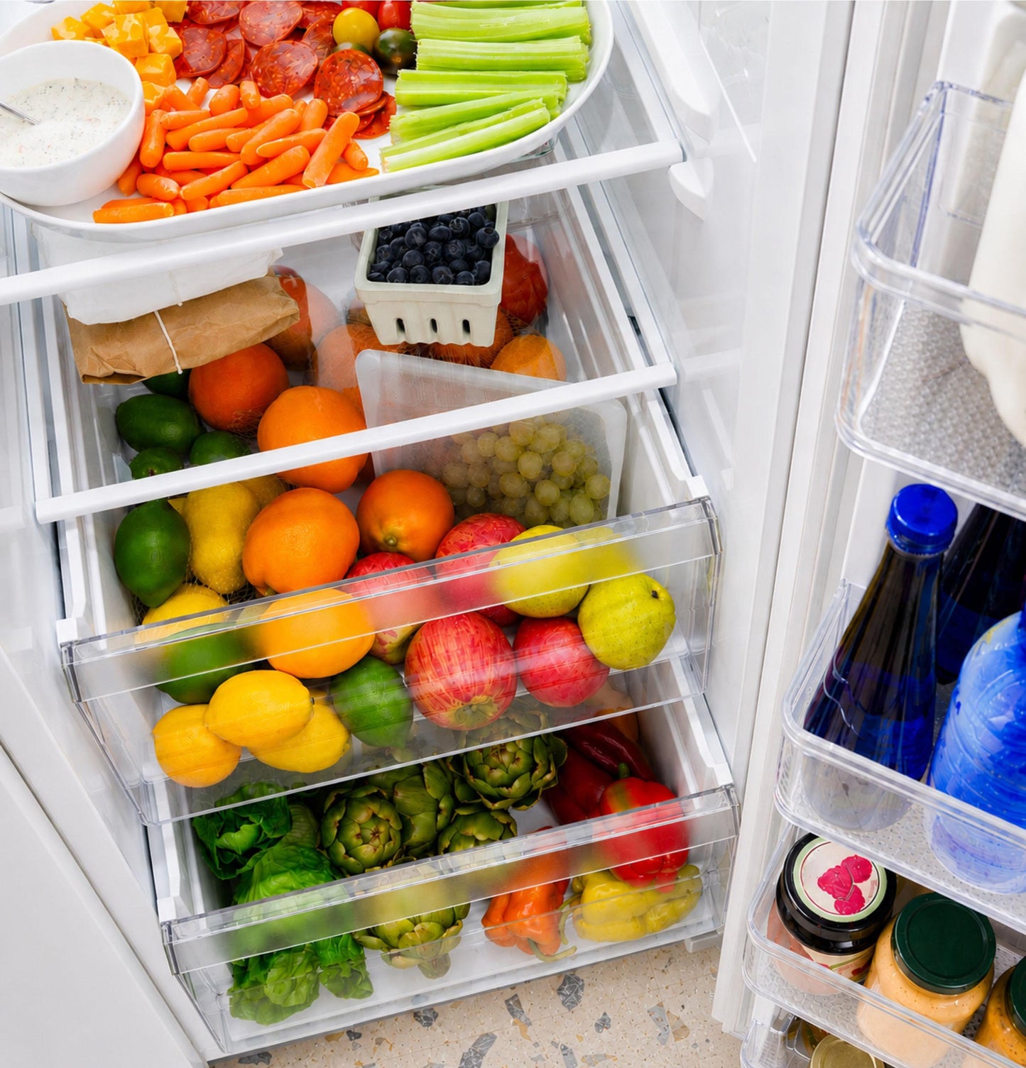 GZE24NGYWW GE® ENERGY STAR® 23.6 Cu. Ft. Counter-Depth Side-By-Side Refrigerator with Extra Tall Dispenser and In-Door Icemaker