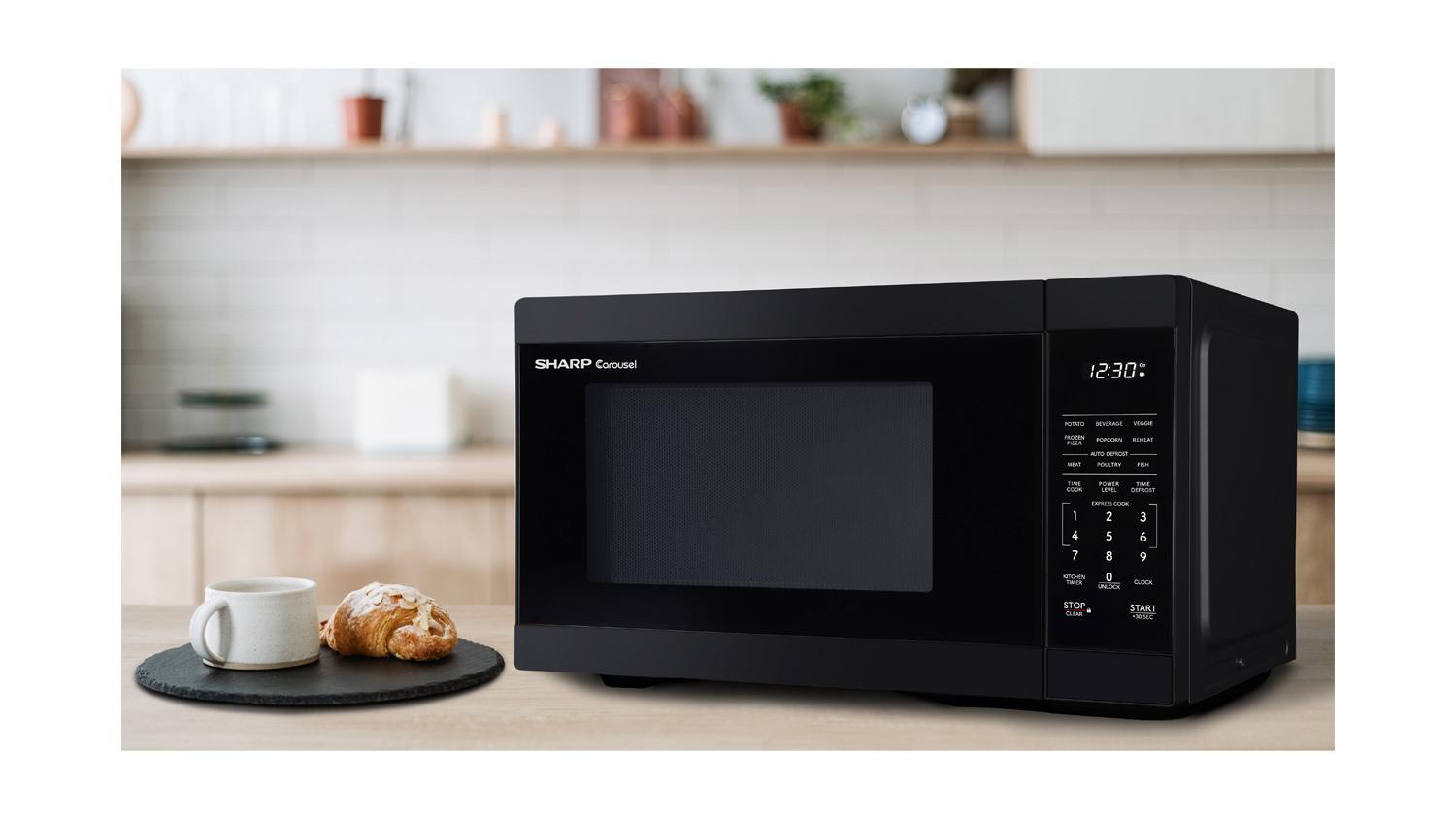 SMC1161KB Sharp 1.1 cu. ft. 1000W Black Countertop Microwave Oven