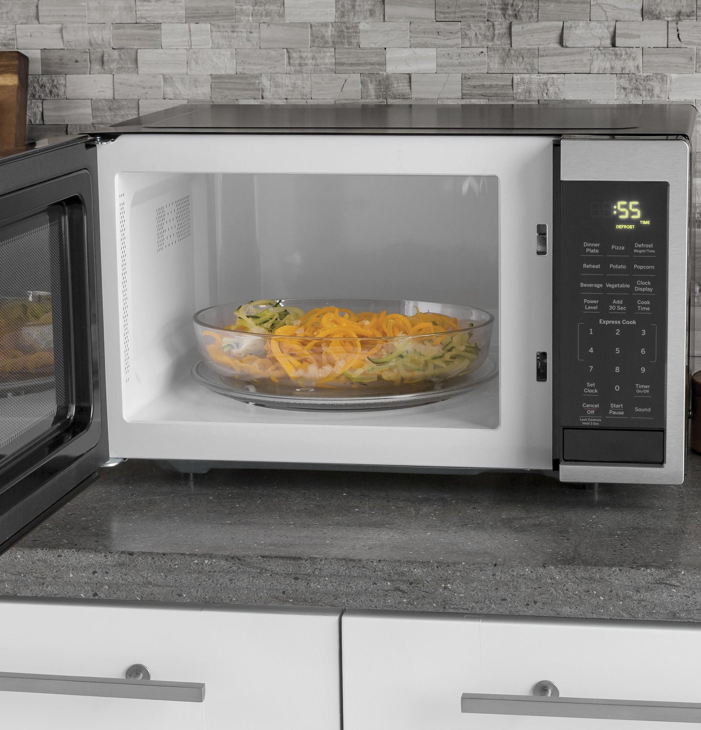 GE® 0.9 Cu. Ft. Capacity Countertop Microwave Oven
